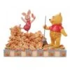 Disney - Piglet & Pooh Jumping Into Fall Figurine